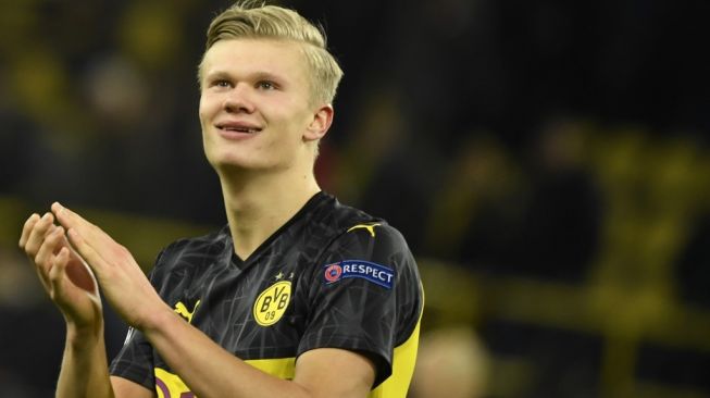 Ekspresi kegembiraan penyerang Borussia Dortmund, Erling Braut Haaland usai laga Liga Champions 2019/2020 kontra Paris Saint-Germain di Signal Iduna Park, Rabu (19/2/2020) dini hari WIB. [Ina Fassbender / AFP]