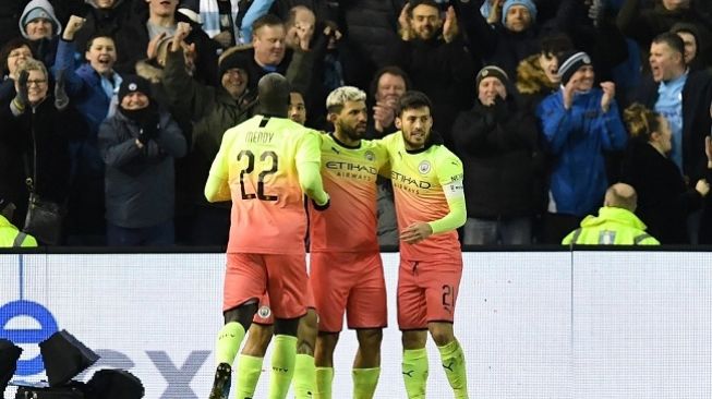 Striker Sergio Aguero merayakan gol ke gawang Sheffield Wednesday dan memastikan Manchester City lolos perempat final Piala FA, Kamis (5/3/2020) dini hari WIB. (Foto: AFP)