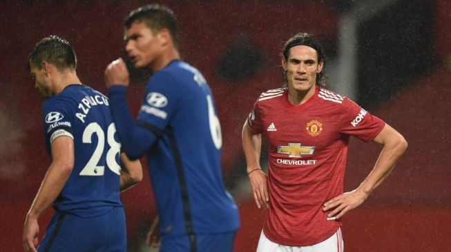 Ekspresi penyerang Manchester United, Edinson Cavani pada laga Liga Inggris 2020/2021 kontra Chelsea di Old Trafford, Manchester, MInggu (25/10/2020) dini hari WIB. [Oli SCARFF / POOL / AFP]