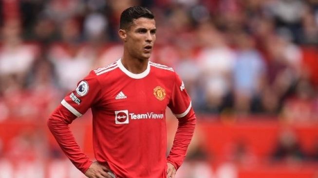 Striker Manchester United Portugal Cristiano Ronaldo bermain sebagai starter saat menghadapi Newcastle United di Old Trafford di Manchester, pada 11 September 2021.Oli SCARFF / AFP