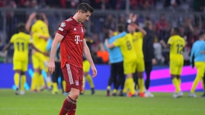 Reaksi pemain depan Bayern Munich Robert Lewandowski usai laga perempat final Liga Champions UEFA, pertandingan sepak bola leg kedua FC Bayern Munich v FC Villarreal di Munich, Jerman pada 12 April 2022.Jose Jordan/AFP